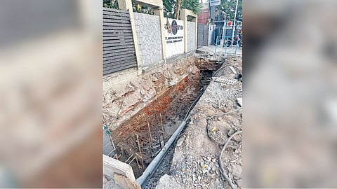 Deep uncovered channels seen blocking entrances of houses on Medavakkam Tank Road in Kilpauk