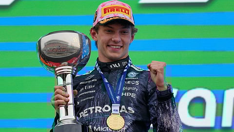 Mercedes driver Kimi Antonelli of Italy reacts on the podium after winning the Japanese Formula One Grand Prix at Suzuka in central Japan