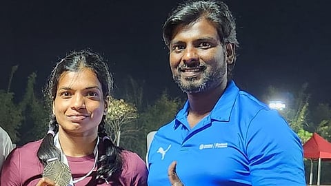 Baranica Elangovan and her coach