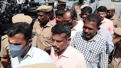 Accused police personnel who appeared before the Madurai District Court in connection with the Sathankulam father-son murder case.