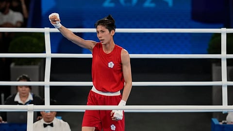 Taiwan’s Lin Yu-ting celebrates after defeating Poland’s Julia Szeremeta in their women’s 57 kg final boxing match at the 2024 Summer Olympics, Saturday, Aug. 10, 2024, in Paris, France