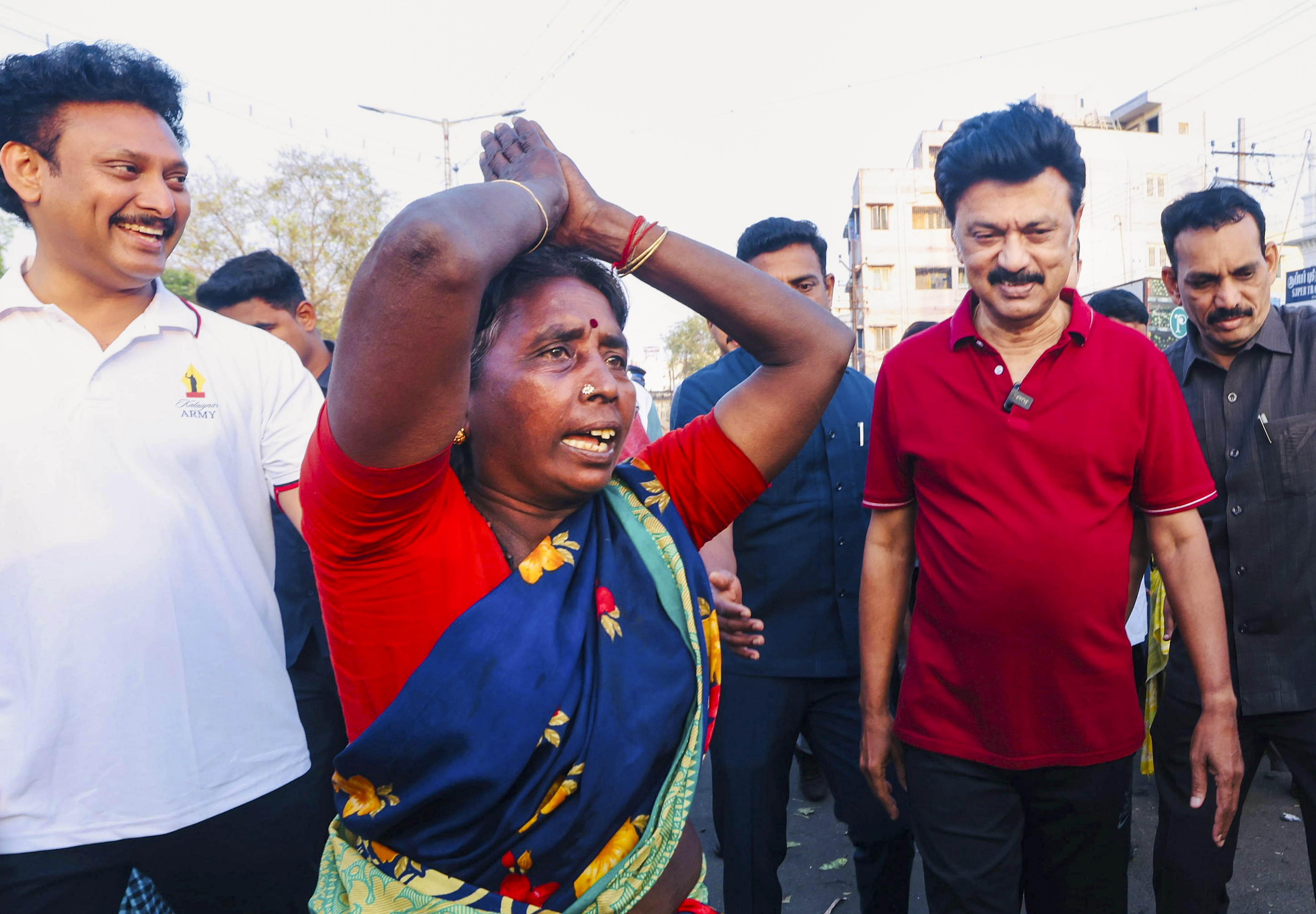 Tamil Nadu Chief Minister and DMK President MK Stalin, centre, interacts with supporters at a local tea shop in Palakkarai as he campaigns across different constituencies of Tiruchirappalli district in support of party candidates ahead of the state assembly elections, Wednesday, April 01, 2026.