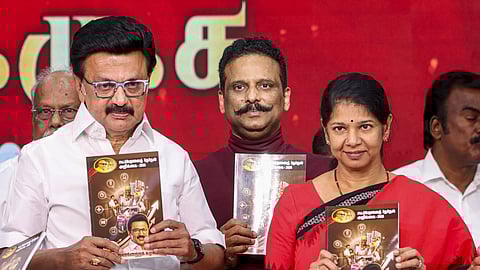 DMK President and Tamil Nadu Chief Minister MK Stalin, left, party leader Kanimozhi Karunanidhi, right, with others during the release of the party's manifesto for the upcoming state Assembly elections, at Anna Arivalayam, in Chennai