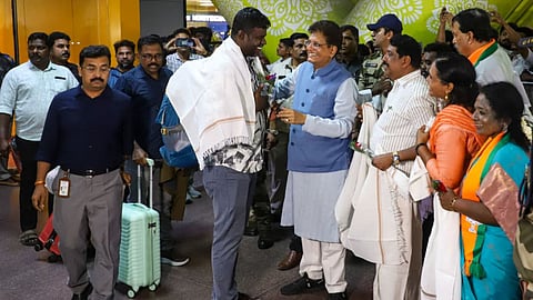 Union Minister Piyush Goyal welcomes fishermen at the Chennai Airport