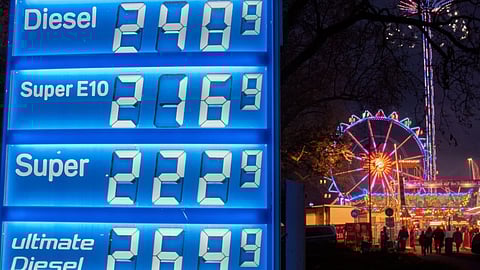 Gas prices are displayed near a ferris wheel in Frankfurt, Germany, Thursday, April 2, 2026.