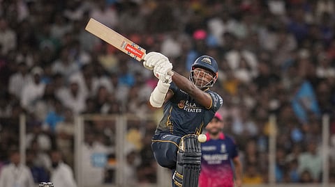 captain Rashid Khan, left, and umpire Rohan Pandit during an Indian Premier League (IPL) 2026 T20 cricket match between Gujarat Titans and Rajasthan Royals, in Ahmedabad, Gujarat, Saturday, April 4, 2026.