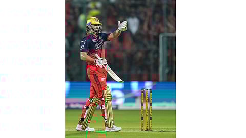 Chennai Super Kings' Noor Ahmad, left, interacts with wicketkeeper Sanju Samson during an Indian Premier League (IPL) 2026 T20 cricket match between Royal Challengers Bengaluru and Chennai Super Kings, in Bengaluru, Karnataka, Sunday, April 5, 2026