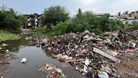 A vacant land abutting Gangai Amman Street in Virugambakkam has turned into a garbage dump 