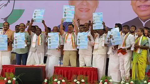 Congress leader Rahul Gandhi releasing the party manifesto in Puducherry on April 6.