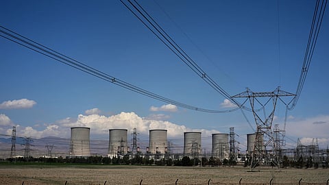 The Damavand power station is seen from a nearby road on the outskirts of Tehran, Iran, Tuesday, April 7, 2026.