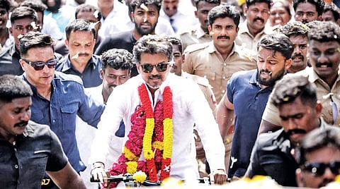TVK chief Vijay riding a bicycle in Karaikudi on Friday