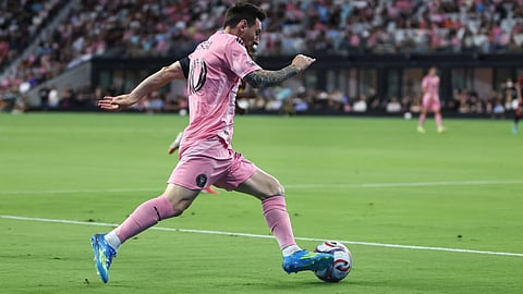 Inter Miami forward Lionel Messi attacks with the ball in the first half during an MLS soccer match against the New York Red Bulls