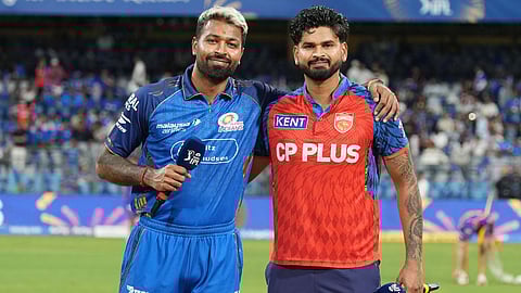 Punjab Kings skipper Shreyas Iyer with Mumbai Indians captain Hardik Pandya during the toss at Wankhede stadium in Mumbai.