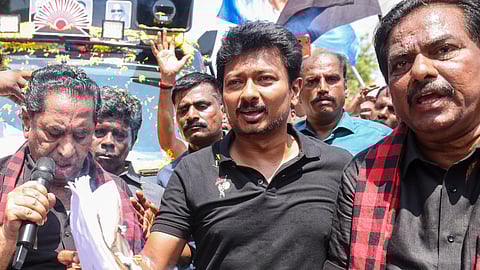 Tamil Nadu Deputy Chief Minister and DMK Youth Wing Secretary Udhayanidhi Stalin, centre, along with party workers burn copies of the proposed Delimitation bill during a protest, at the party office, in Madurai, Thursday, April 16, 2026