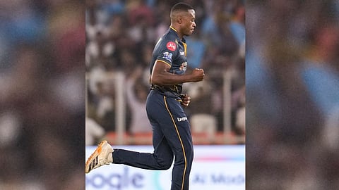 Gujarat Titans' Kagiso Rabada, right, and Glenn Phillips during the Indian Premier League (IPL) 2026 T20 cricket match between Gujarat Titans and Kolkata Knight Riders, in Ahmedabad, Gujarat, Friday, April 17, 2026