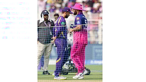 Rajasthan Royals' captain Riyan Parag, right, and Kolkata Knight Riders' captain Ajinkya Rahane at toss during the Indian Premier League (IPL) 2026 T20 cricket match between Kolkata Knight Riders and Rajasthan Royals, at Eden Gardens in Kolkata, West Bengal, Sunday, April 19, 2026 