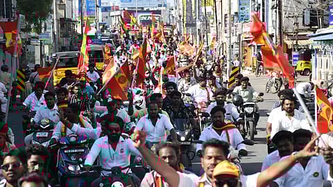 TVK supporters take a bike rally on the last campaign day to garner votes for party chief Vijay in Tiruchy East on Tuesday