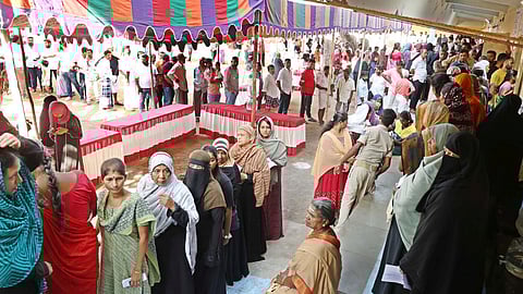 Voters turn up in large numbers to exercise their democratic right at a polling station in Kuniamuthur in Coimbatore