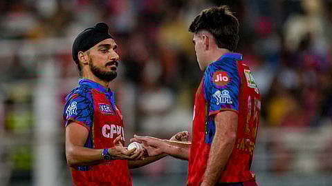 Punjab Kings' Arshdeep Singh, left, and Xavier Bartlett during the Indian Premier League (IPL) 2026 T20 cricket match between Punjab Kings and Lucknow Super Giants, in New Chandigarh, Punjab, Sunday, April 19, 2026