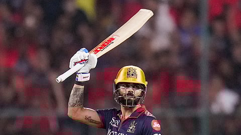 Royal Challengers Bengaluru's Virat Kohli celebrates his half century during an Indian Premier League (IPL) 2026 T20 cricket match between Royal Challengers Bengaluru and Gujarat Titans, in Bengaluru, Karnataka, Friday, April 24, 2026 