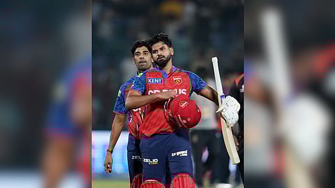 Punjab Kings' captain Shreyas Iyer, front, and Shashank Singh after winning the Indian Premier League (IPL) 2026 T20 cricket match between Delhi Capitals and Punjab Kings, in New Delhi