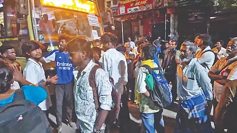 Angry passengers blocking road in protest 