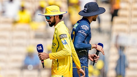 Chennai Super Kings captain Ruturaj Gaikwad, right, and Gujarat Giants captain Shubman Gill during the toss before an Indian Premier League (IPL) T20 cricket match between Chennai Super Kings and Gujarat Titans, in Chennai, Tamil Nadu, Sunday, April 26, 2026. 