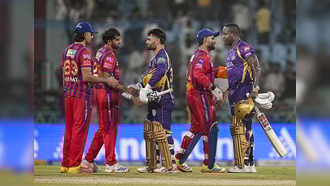 Kolkata Knight Riders' Rinku Singh, front centre, and Rovman Powell, right, being congratulated by Lucknow Super Giants' captain Rishabh Pant, second right, and others after winning the Indian Premier League (IPL) 2026 T20 cricket match in a super over, in Lucknow