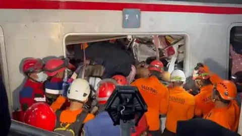 Rescuers have finished removing victims from a damaged commuter train car, confirming the crash outside Indonesia’s capital killed 14 people.