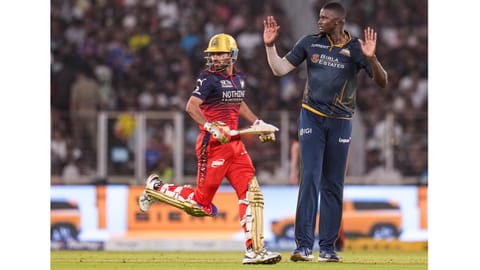 Gujarat Titans' Jason Holder reacts after bowling a delivery during the Indian Premier League (IPL) 2026 T20 cricket match between Gujarat Titans and Royal Challengers Bengaluru, in Ahmedabad, Gujarat, Thursday, April 30, 2026. 