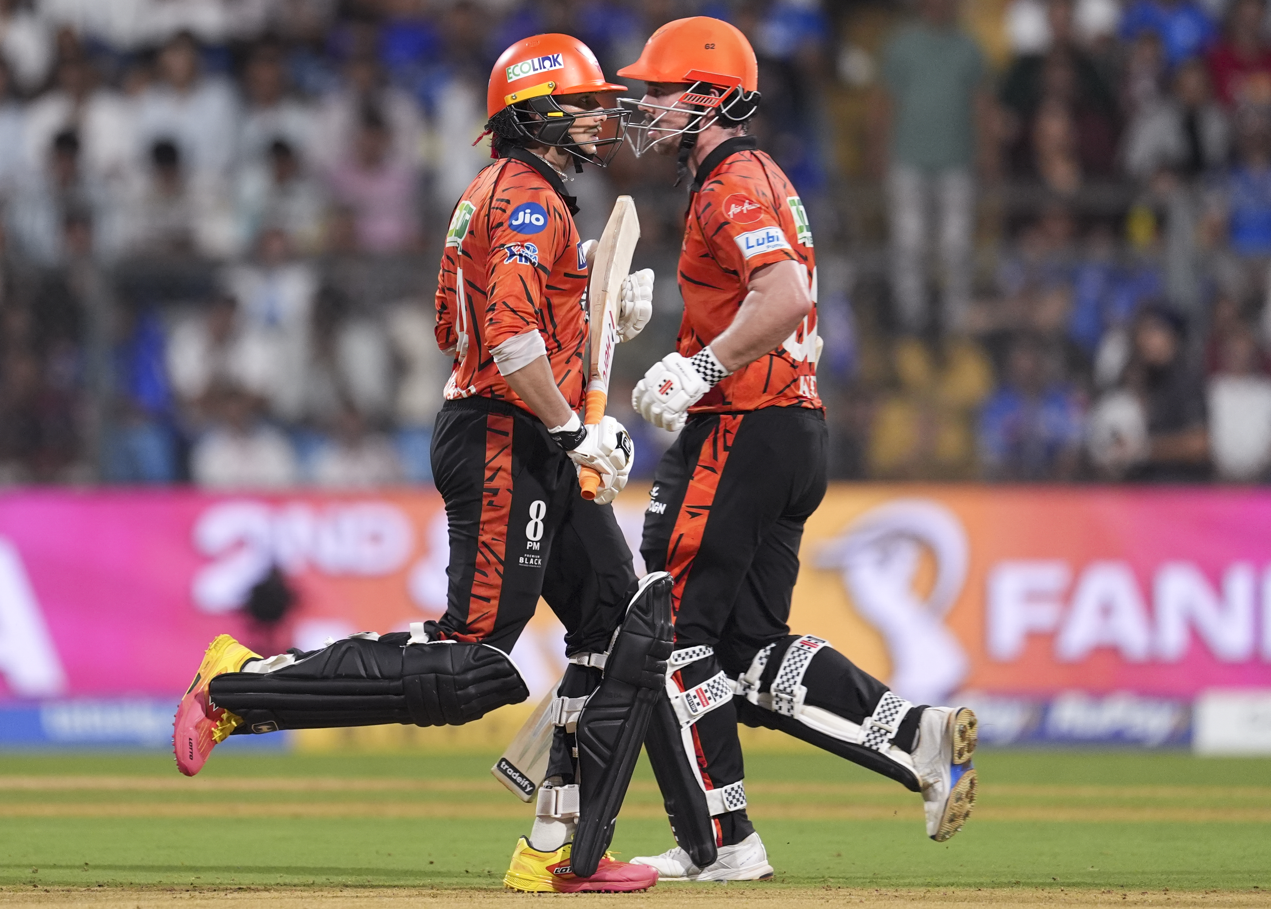 Sunrisers Hyderabad's Travis Head, left, and Abhishek Sharma run between the wickets during an Indian Premier League (IPL) 2026 T20 cricket match between Mumbai Indians and Sunrisers Hyderabad, in Mumbai, Maharashtra, Wednesday, April 29, 2026. 