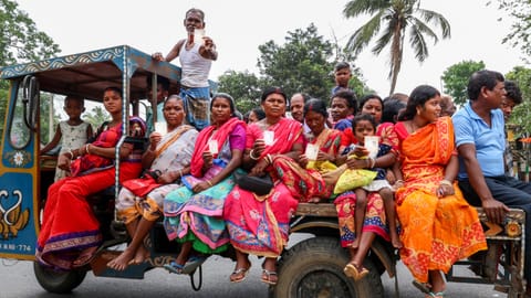 Voters arrive to cast votes at a polling booth during the West Bengal Assembly elections, in Purba Bardhaman district, Wednesday, April 29, 2026 