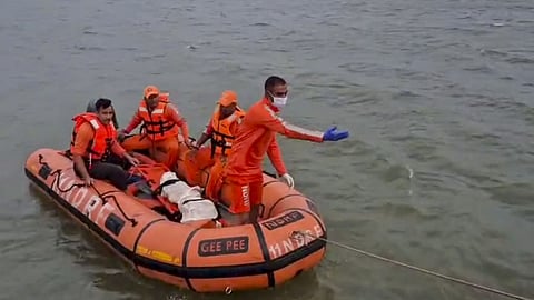 Rescue personnel conduct a search operation after the cruise boat tragedy that occurred on Thursday, in Jabalpur district, Madhya Pradesh, Sunday, May 3, 2026. The bodies of two boys were recovered on Saturday evening from the Bargi Dam in the district, raising the death toll in the tragedy to 11, while search continued for two missing persons.