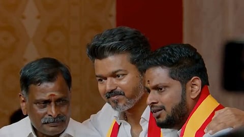 TVK chief Vijy with (L) R Sabarinathan