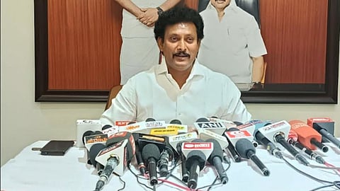 Anbil Mahesh addressing media in Tiruchy