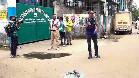 Forensic team officials investigating the crime scene following the killing of BJP leader Suvendu Adhikari's close aide Chandranath Rath