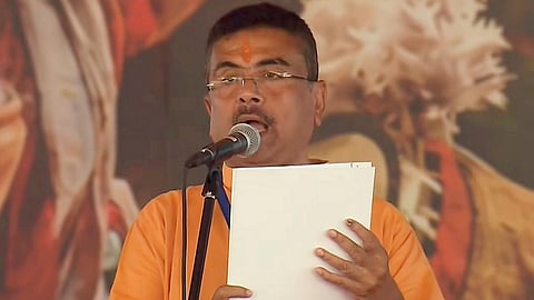 BJP leader Suvendu Adhikari takes the oath, as he becomes West Bengal's Chief Minister, at Brigade Parade Ground in Kolkata