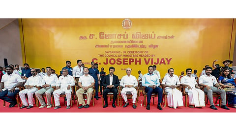 Tamil Nadu Governor Rajendra Arlekar along with Congress MP and Lok Sabha LoP Rahul Gandhi, newly-elected state Chief Minister and TVK chief C Joseph Vijay and the TVK Cabinet Ministers during the swearing-in ceremony, at Jawaharlal Nehru Stadium, in Chennai 