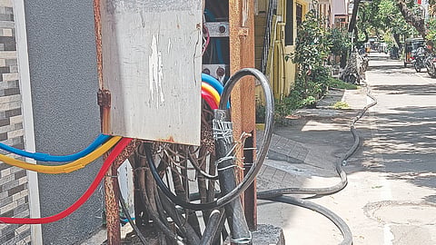 Temporary electric wires lying on MKB Nagar 11th Cross Street in Vyasarpadi