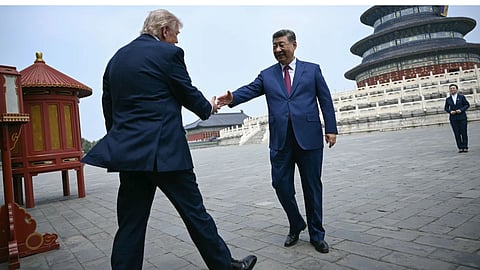 China’s President Xi Jinping, right, and U.S. President Donald Trump shake hands at the Temple of Heaven in Beijing Thursday, May 14, 2026.