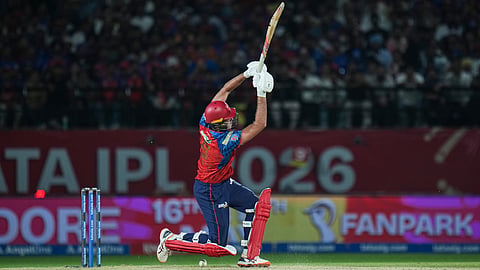 Punjab Kings' Xavier Bartlett plays a shot during an Indian Premier League (IPL) 2026 T20 cricket match between Punjab Kings and Mumbai Indians, in Dharamshala, Himachal Pradesh, Thursday, May 14, 2026 