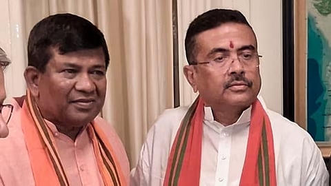 BJP first-time MLA from Cooch Behar Dakshin constituency Rathindra Bose (L) with West Bengal chief minister Suvendu Adhikari