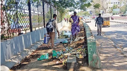 Pedestrians walking at Dr Guruswamy Bridge in Chetpet