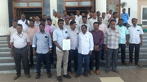 Members of Tasmac Employees' Union outside the Mayiladuthurai Collectorate after submitting a petition