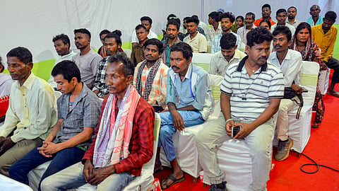 Family members of 27 Maoists attend an event after their surrender, in Ranchi, Jharkhand, Thursday, May 21, 2026 