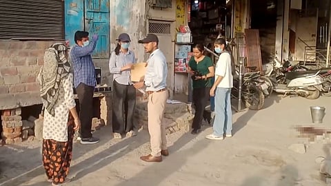 Forensic team officials investigate a crime scene where two minors were allegedly stabbed to death while another sustained injuries following a violent clash between two groups over a past rivalry on Wednesday evening, at Sector-20 of Rohini area, in New Delhi, Thursday, May 21, 2026 