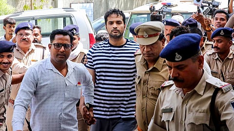 Prime accused Samarth Singh being escorted in the district court in connection with the death case of former model-actor Twisha Sharma, in Bhopal, Wednesday, May 27, 2026