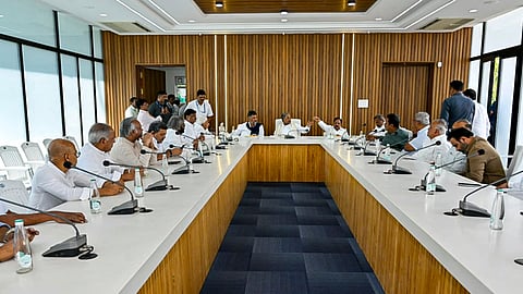 Karnataka Chief Minister Siddaramaiah, along with Deputy Chief Minister DK Shivakumar, chairs a breakfast meeting with cabinet ministers to inform them of his decision to step down, at the CM's residence, in Bengaluru