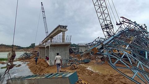 Officials present at the site after part of an under-construction bridge collapsed following a storm over the Betwa river, leaving six labourers dead and three others injured, in Hamirpur district, Uttar Pradesh, early Friday, May 29, 2026