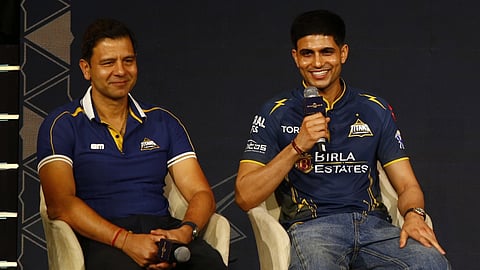 Gujarat Titans skipper Shubman Gill, right, with former England player and GT's director of cricket Vikram Solanki